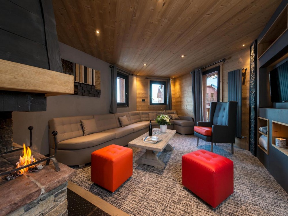 Chalet Altitude - woonkamer met tv en openhaard